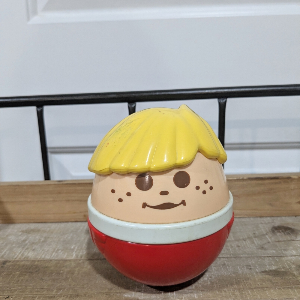 Classic Red and Yellow Weeble Wobble Toy